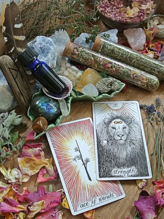 Tarot cards and herbs adorning a cleanse kit